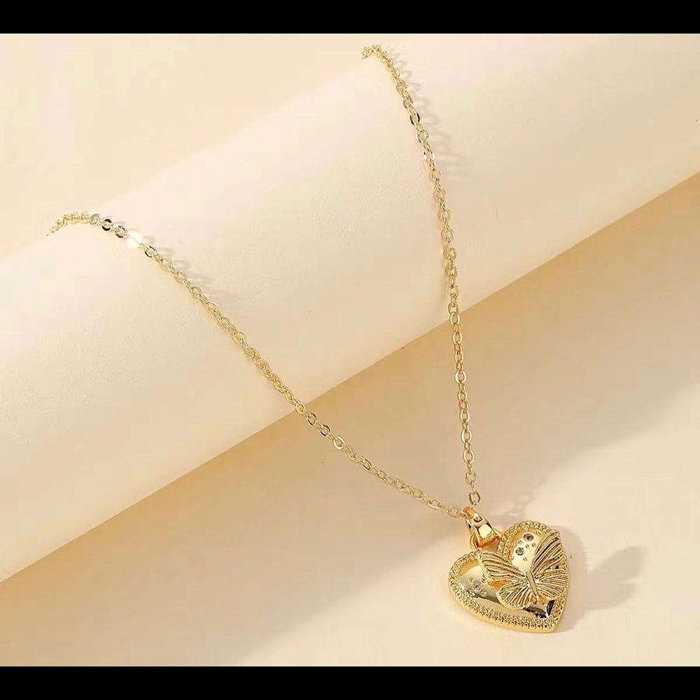Girls delicate butterfly/heart necklace